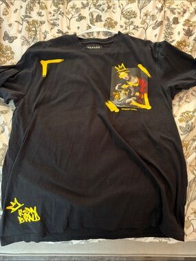 Reason Black Short Sleeve Tee with Yellow Graphic Accents
